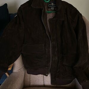Brown leather nylon polyester acrylic jacket for women and men never worn